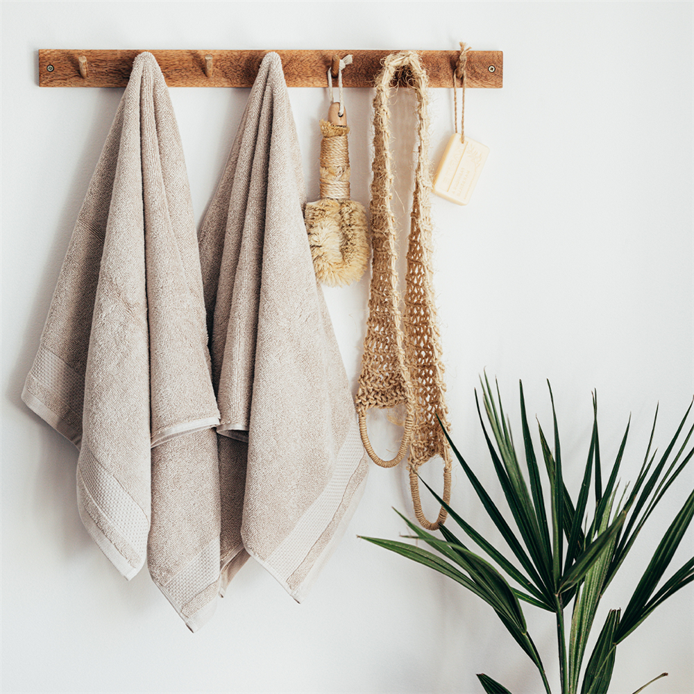  Cosmetic changes like shower curtain, stool, and rug in small bathroom